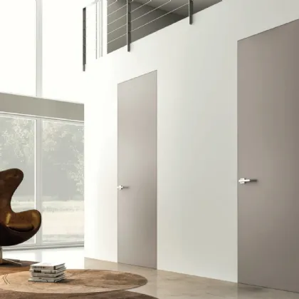 Porta per interni a filo muro A Fil 50 in legno laccato di Zemma