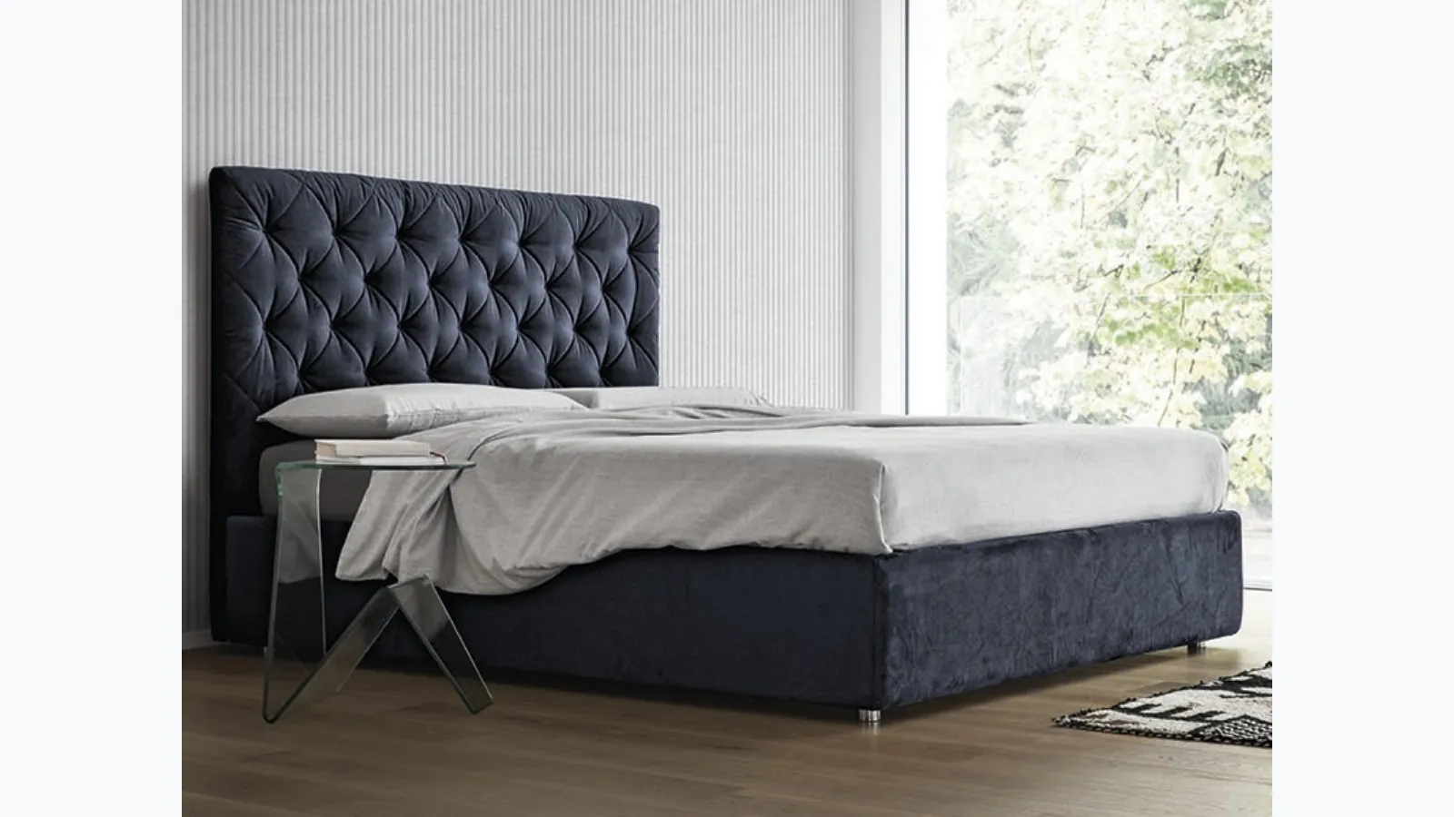 Letto in tessuto con testiera trapuntata e box contenitore Morfeo di Rigosalotti