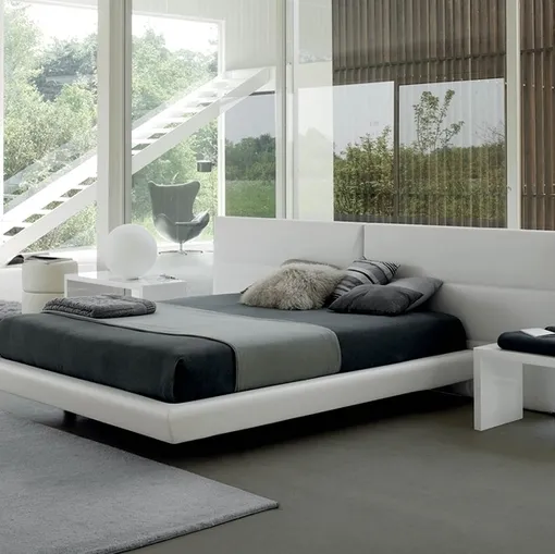 Letto Tolomeo in ecopelle con testiera di Rigosalotti