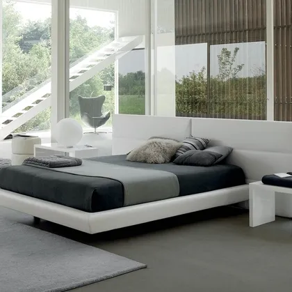 Letto Tolomeo in ecopelle con testiera di Rigosalotti